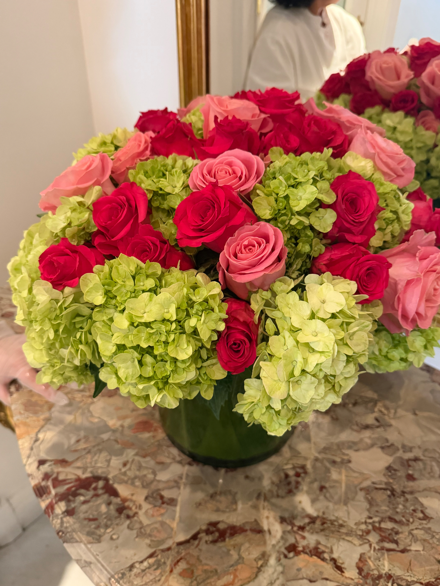 Weekly restaurant floral arrangement delivered by Blossom Logistics Co.